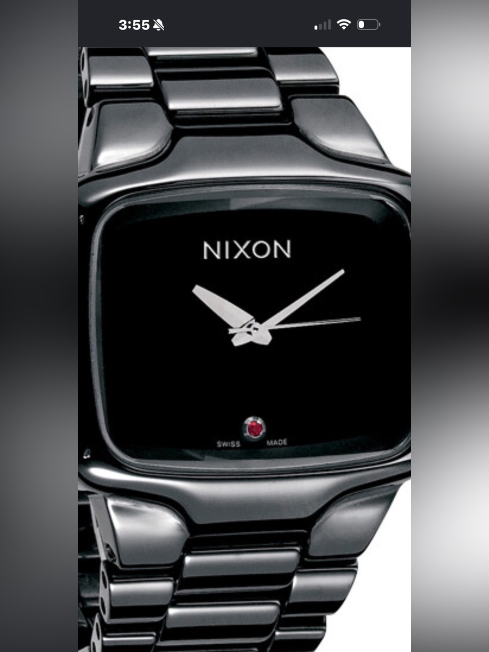 Nixon Black Ceramic Bracelet Watch with ruby at 6 o’clock